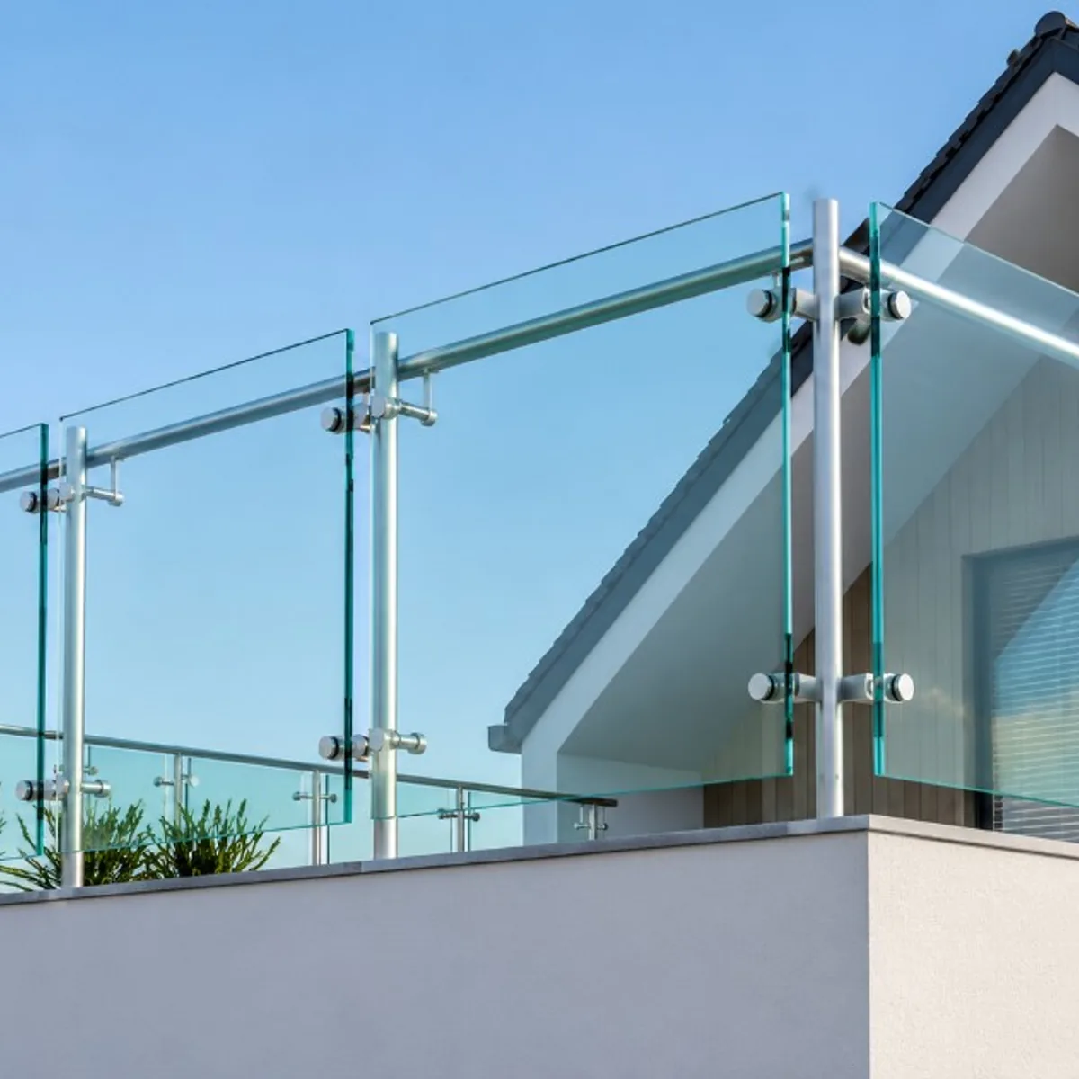 Toughened glass balcony railing with stainless steel posts